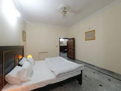 Room 3 Serene Retreat in Rawalpindi - Guest Room with Shared Facilities Family O