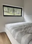 Brand new cabin with cliff views, hiking trails, heated spa, farm stay