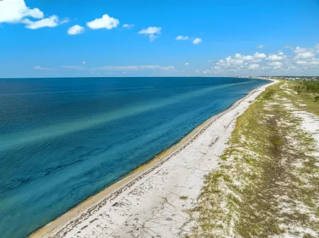 Direct Water Views in  Windmark Beach Home.