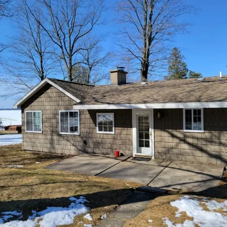 Hubbard Lake Sunset Hideaway, large lakefront property.