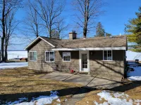 Hubbard Lake Sunset Hideaway, large lakefront property.