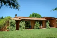 Eco Cottage in charming village in rural Costa Brava. Swimming pool-big garden