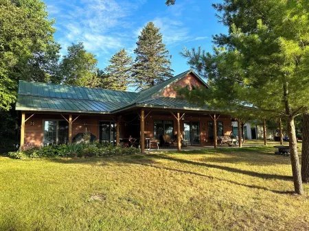 Lakefront home ice fishing snowmobile  trail access with beautiful sunrise view