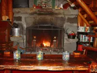 Laughing Bear Log Cabin, historical, sleeps 8, full kitchen, 2 dining areas!!
