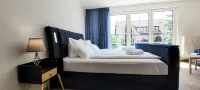 Terrasse - Parkplatz - TV im Boxspringbett - Küche Institute of Applied Physics附近的飯店