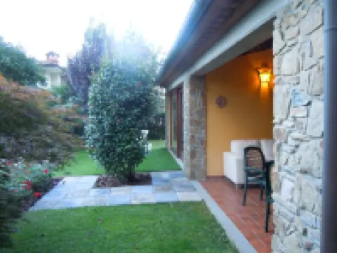 House with large veranda, garden and swimming pool