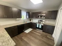 2 Separate Units in one Building w/ Private Entrances and Parking