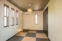 Isola Villa Amami Hotel a Tatsugō
