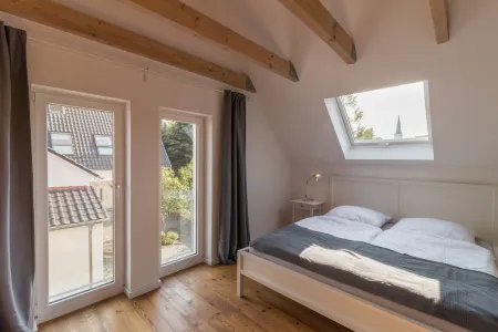 "Brunnenhaus": Stylish vacation home with Mediterranean courtyard and huge garden Отели рядом с достопримечательностью «Университет Майнца»