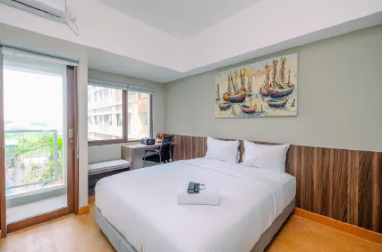 Comfortable Pool View Studio Room at LRT City Jatibening Apartment