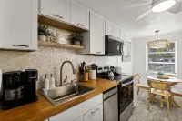 Deeded Beach Access and Private Balcony - Charming Coastal Haven