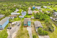 Dog-friendly home with gas grill, arcade machine, deck, & TV - close to ocean