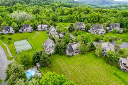 Ample Seating and Access to Quechee Club Amenities - Cozy Retreat