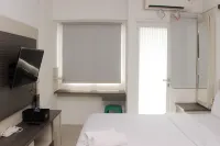 Cozy and Warm Studio at Grand Sentraland Karawang Apartment