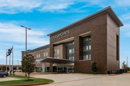 Four Points by Sheraton Plano Отели рядом с достопримечательностью «TUMI Store - Legacy West»