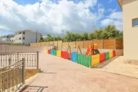 Karras Grande Resort Hotels in Planos