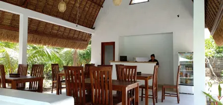 Bale Lumbung Bungalows Отели рядом с достопримечательностью «Нуса-Ченинган»
