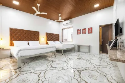 Coco Bliss by Mauli Stays Hotels near Vishram Dham (Arogya Dham Vridha Ashram)