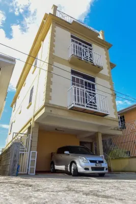 Timbo's Apartelle Hotels near Canefield East II