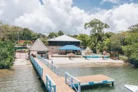 Spacious 5-bedroom beachfront home with AC centrally located in Roatan.
