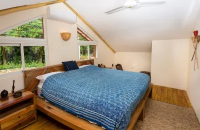 Private retreat with jungle spa, short walk from quiet beach