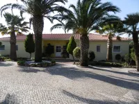 Bungalow with apartment in a quiet location and large pool
