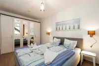 Cozy apartment by the sea with terrace and sauna