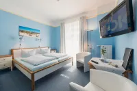 Hotel am Wind Hotels in Puttgarden