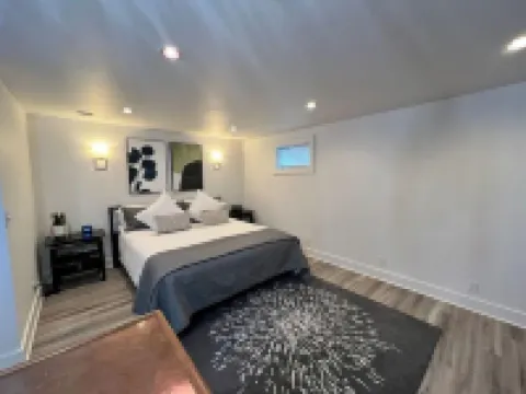 Spacious basement apt. Off-street parking, washer & dryer, kitchenette, sleeps 4