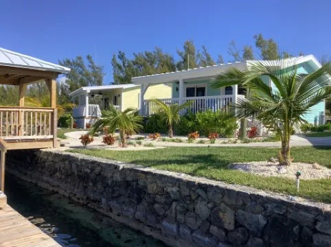 Cozy private green studio cottage on water free floating dock at your doorstep