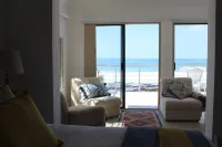 @The Waves beach accommodation with sea and mountain views!7 Bedrooms
