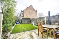 Chic House With Free Parking and Private Backyard