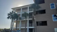 Top Floor Corner Condo with sweeping views of Perdido Key 100ft to the Beach!
