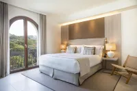 Mangia's Santa Teresa Sardinia, Curio Collection by Hilton - parking