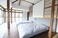 Amami Oshima a Mansion with a Coral Island and a فنادق في أمامي