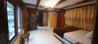 Rumah Panggung Mila Family Hotels in Bayah