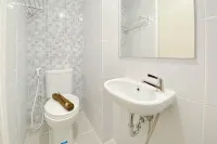 Warm and Simply Studio at Tokyo Riverside PIK 2 Apartment By Travelio - Wi-Fi