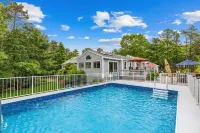 Family Oasis with Pool, Game Room, & Outdoor Kitchen - Walk to Beach & Trails!