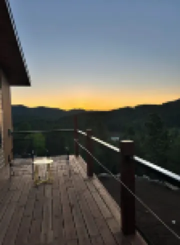 Casa del Sol is a private oasis surrounded by trees near Pactola Lake.