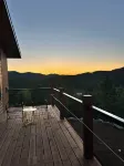 Casa del Sol is a private oasis surrounded by trees near Pactola Lake.