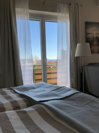 Light-flooded vacation apartment in the center with a view of the fishing boats