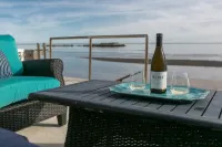 Waterfront House with picture-perfect views from all 3 levels.
