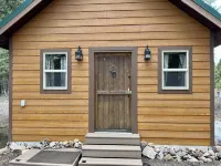 Loft cabin nestled in the woods with two acres to yourself.