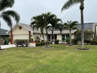 Villa Carina - Gulf Access Canal Home with Solar & Electric Heated Pool