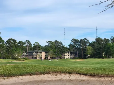 Cozy King Condo on True Blue Golf Club steps from pool hot tub + State Park Pass