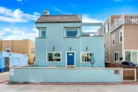 Chic 2BR Retreat - Steps to Beach, Exclusive Patio, Garage Parking