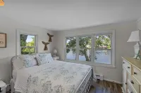 Stunning waterfront home with big yard & dock! Voted #1 rental in all of RI!