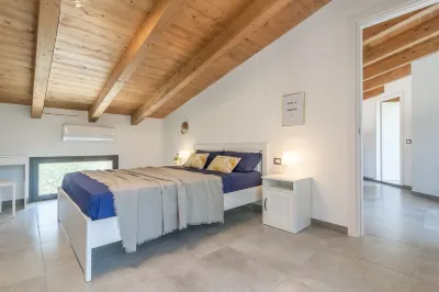 Detached villa with outdoor hot tub, swimming pool and lawn