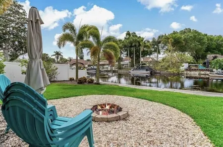 Lakehouse Living w/ Firepit and Boat Dock to relax and Enjoy the Sunset