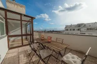 City Center Grand Apartment with Seaview Terrace by Vacationy